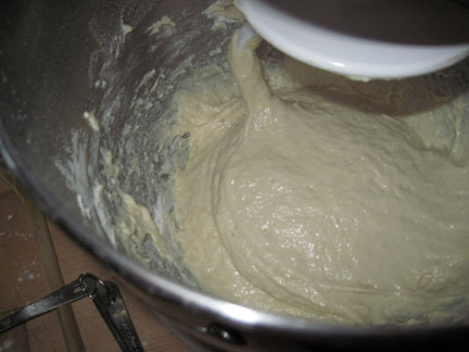Add in vegetable oil, salt and 2 cups of flour