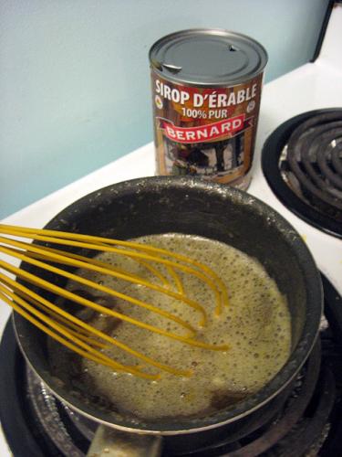 Bring maple syrup to a boil then
