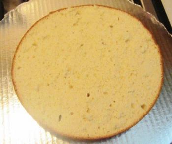 Gradually brush all the milk soaking liquid into all sides of the cake