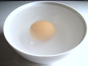 eggs in a glass bowl of salty water
