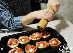 Sprinkle each pizza muffin with olive oil salt and pepper