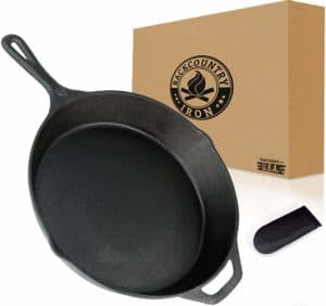 The Backcountry Cast Iron Skillet is pictured over a field of white