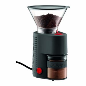 The Bodum Bistro Burr Grinder is pictured over a field of white
