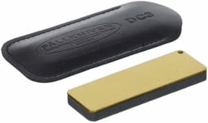 The Fallkniven DC3 Whetstone Diamond Ceramic Knife Sharpener is pictured over a field of white