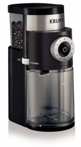 The KRUPS GX5000 Burr Coffee Grinder is pictured over a field of white