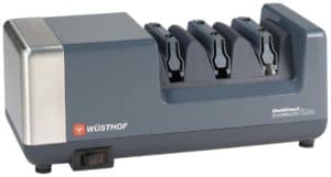 The Wusthof PEtec Electric Sharpener is pictured over a field of white