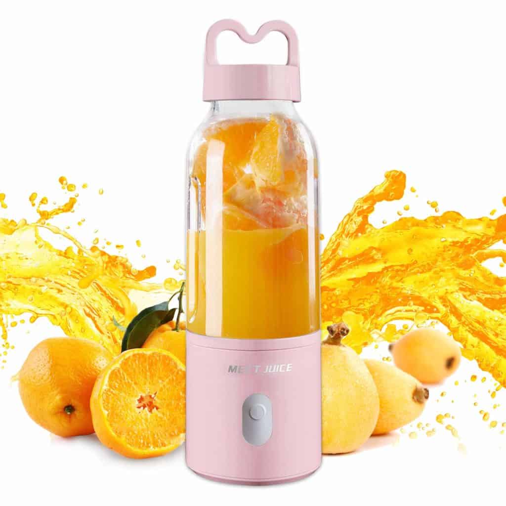 The Granbest Portable Blender is pictured over images of stylized fruit and fruit juice