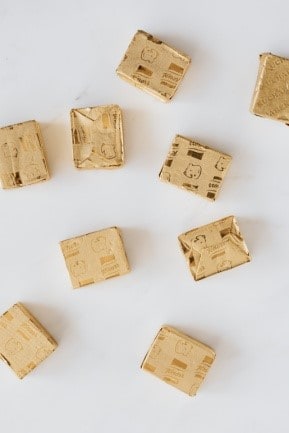 Chicken cubes on white table