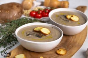 Add fried mushrooms to the soup and serve with garlic croutons