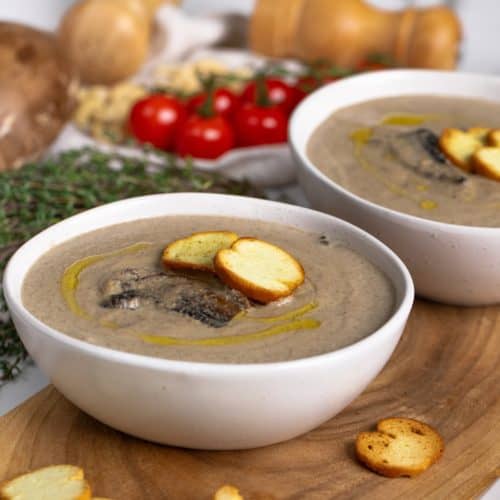 Add fried mushrooms to the soup and serve with garlic croutons