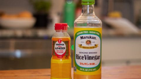 mirin and rice vinegar sitting on a countertop