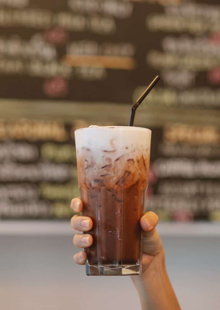 Iced coffee drink with liquid coffee creamer. 