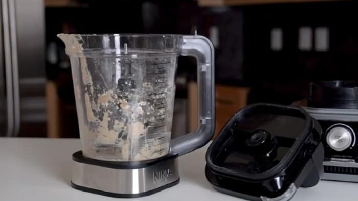 Dirty blender with food stuck inside